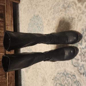 Knee high Fergie boots with small chunk heel